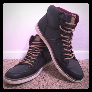 Men’s size 10 US high top shoes.